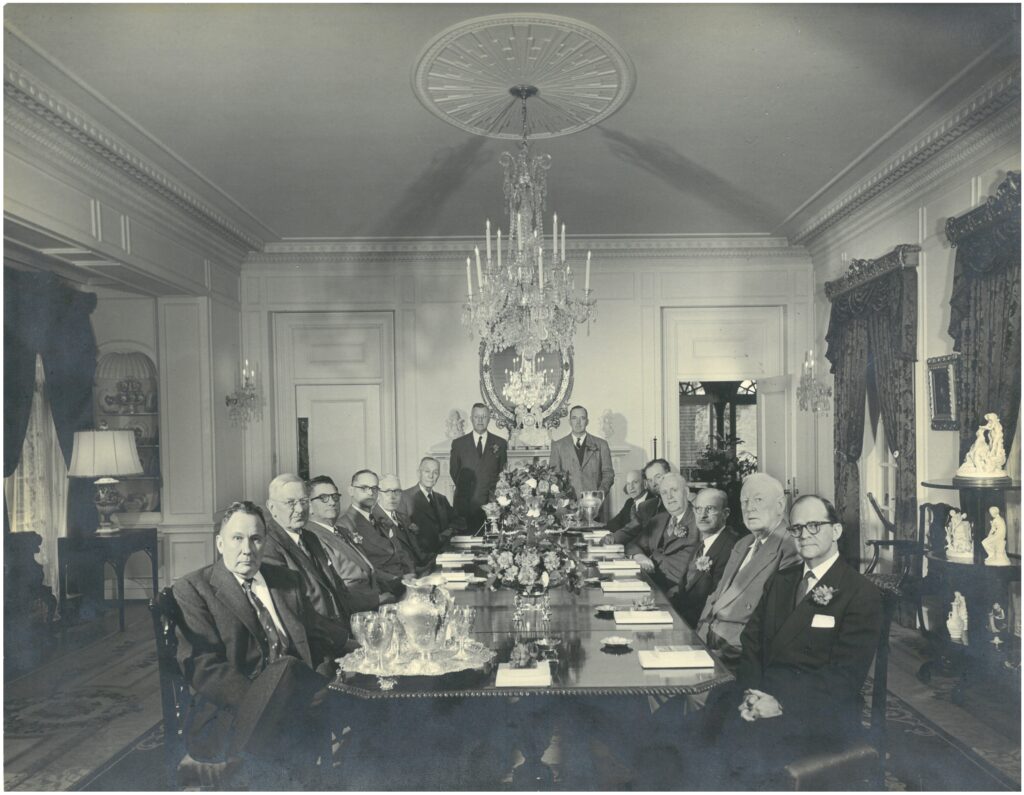 First National Bank Board of Directors meeting, Bellingrath Home Dining Room, Feb. 23, 1953, from left: Stephen B. Quigley, J. Linyer Bedsole, John M. Griser, Herbert Brown, Duncan C. Smith, Walter D. Bellingrath, H. Austill Pharr, Robert Bacon, Mark Lyons, Dr. Joe Mighell, G. Cabell Outlaw, Alfred F. Delchamps, John E. Toomey and Francis H. Inge.